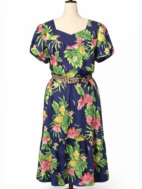 Vintage Hawaiian dress with bottom ruffle, blue with "Hawaii" script muumuu. L